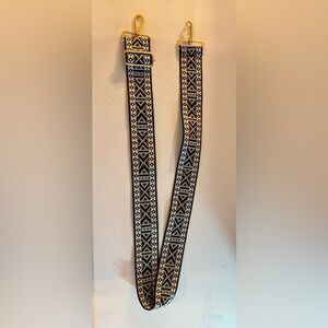 Guitar Strap for crossbody purse. NWOT. Multi colored. Gold hardware extends-50”